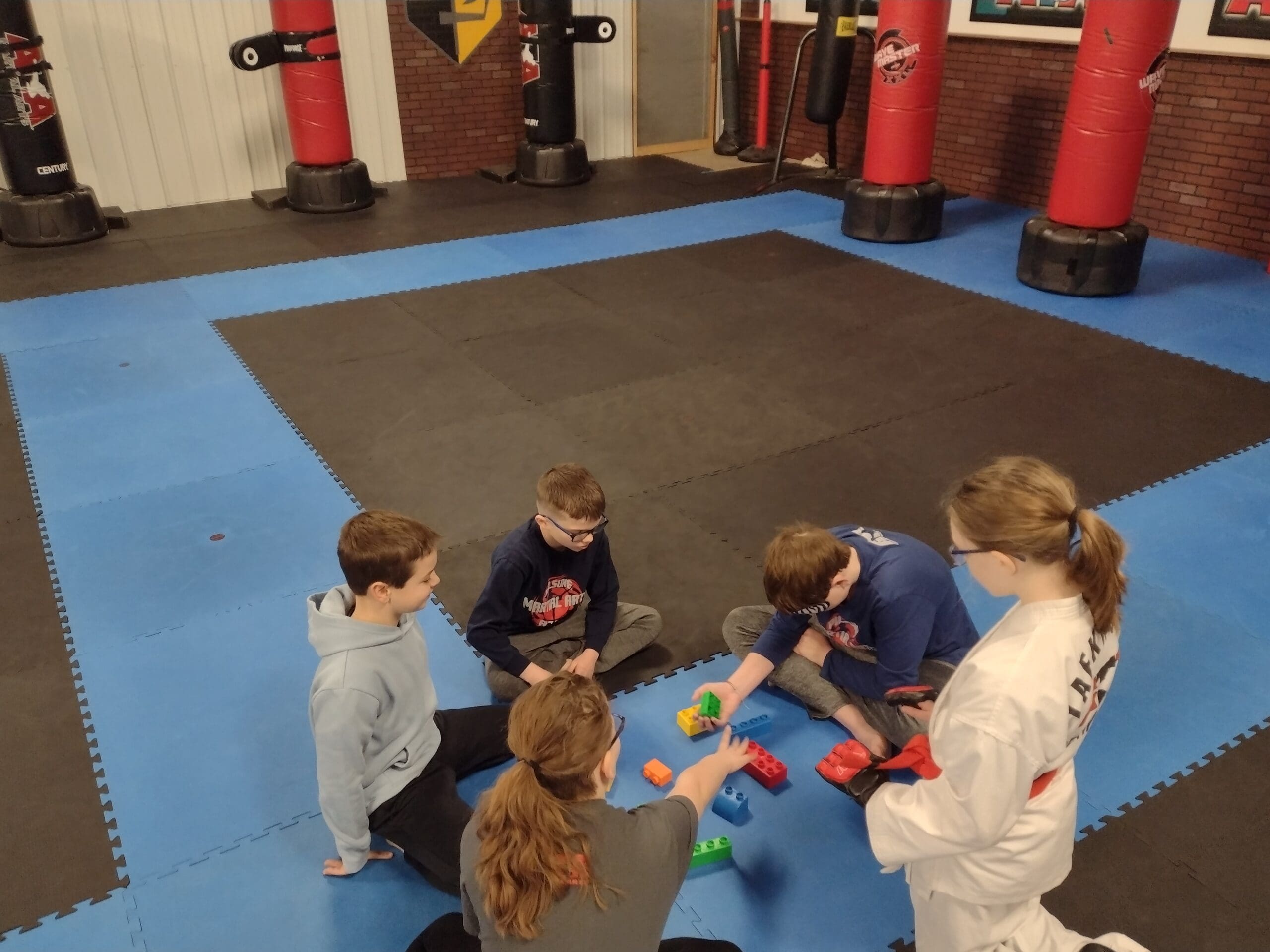 kids struggle with self esteem and self mastery when it comes to team sports. one good fit could be mixed martial arts taught by certified instructors who focus on self improvement more than skill level
