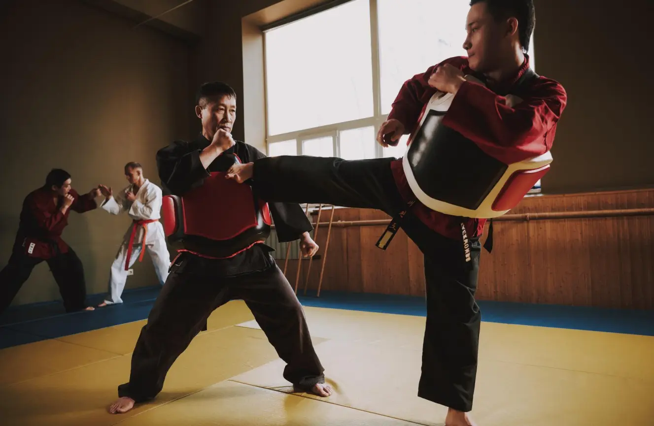 Martial arts schools offer training sessions in traditional martial arts, Chinese martial arts, Korean martial arts, and other martial arts like Brazilian Jiu-Jitsu, Krav Maga, Kung Fu, Muay Thai, Shotokan Karate, and Mixed Martial Arts, combining practical self-defense techniques, joint locks, and mental training to build self-confidence, mental discipline, and create well-rounded martial artists.